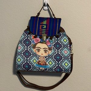 multicolored Frida Kahlo print purse that converts into a mini backpack